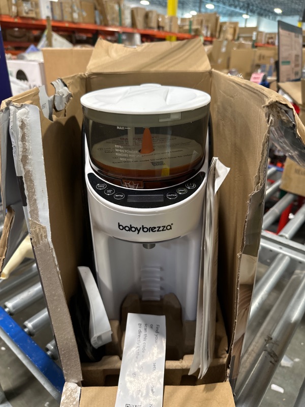Photo 1 of New and Improved Baby Brezza Formula Pro Advanced Formula Dispenser Machine - Automatically Mix a Warm Formula Bottle Instantly - Easily Make Bottle with Automatic Powder Blending