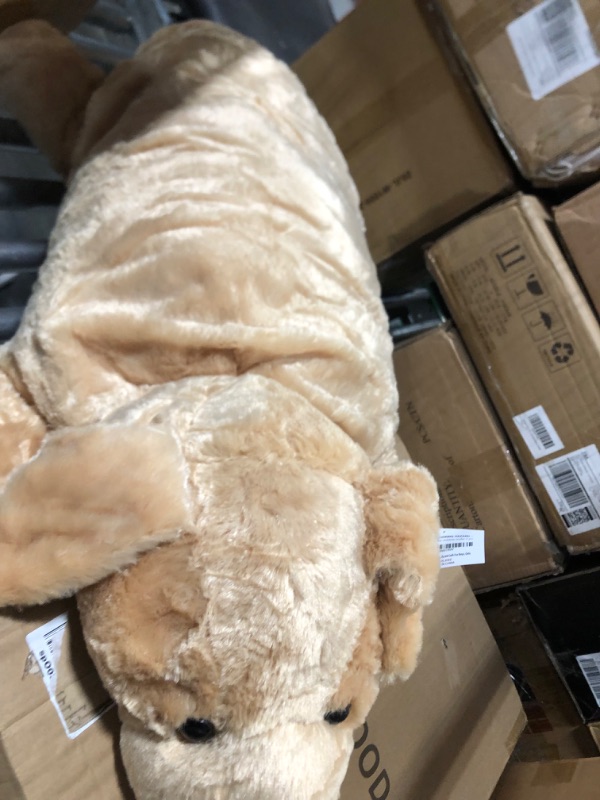 Photo 1 of Extra Large Stuffed Dog Hugging Toy-Giant Sleeping Plush Body Pillow for Kids, Adults-Ideal for Bedroom Bed, Valentine’s Day Gift- 35 by 15 Inches Big, Brown, Fluffy and Soft-for Boys, Girls
