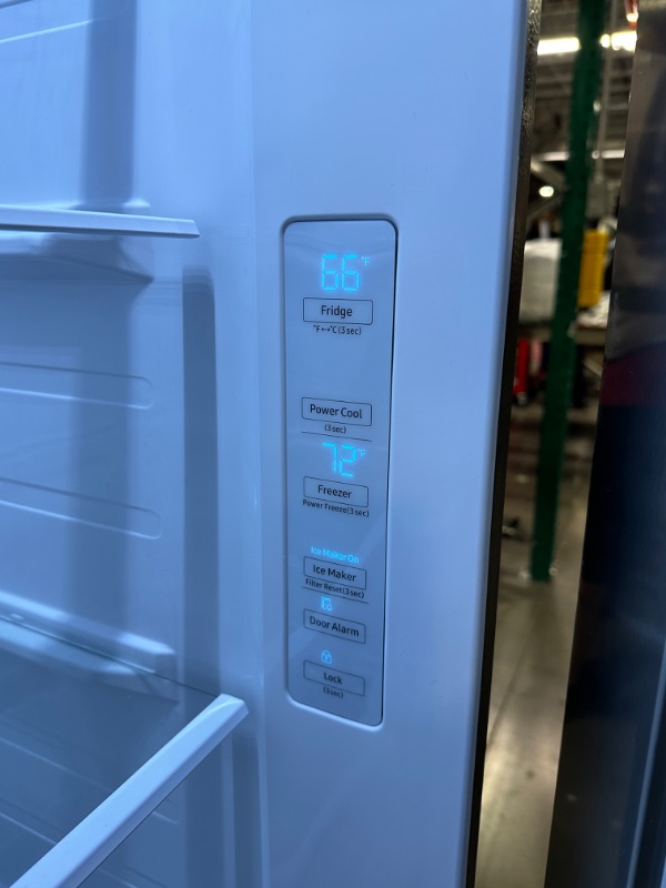 Photo 5 of Samsung 27.4-cu ft Side-by-Side Refrigerator with Ice Maker (Fingerprint Resistant Stainless Steel)
*small stain by ice box* - small dent onside of fridge