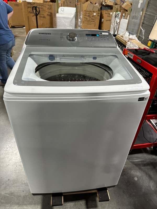 Photo 2 of Samsung 5-cu ft High Efficiency Impeller Top-Load Washer (White) ENERGY STAR
*per notes- no damage* -return type- scratch- unable to locate scratch*
