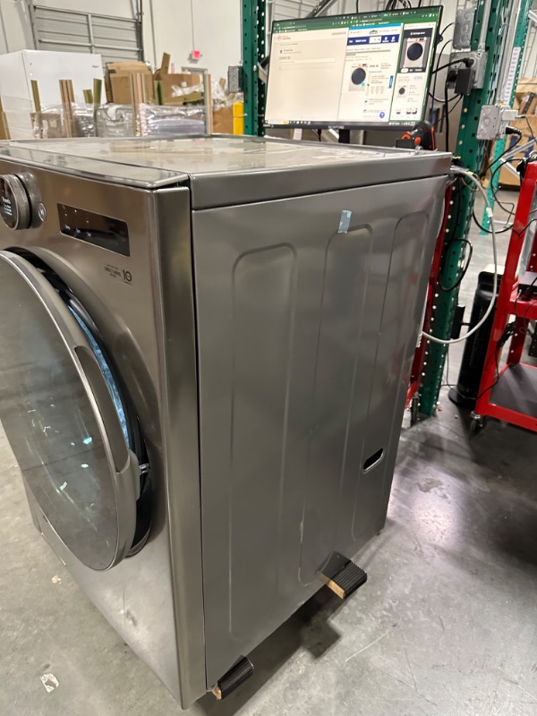 Photo 7 of LG TurboWash 360 4.5-cu ft High Efficiency Stackable Steam Cycle Smart Front-Load Washer (Graphite Steel) ENERGY STAR
*no damage* *missing door for soap-view picture*