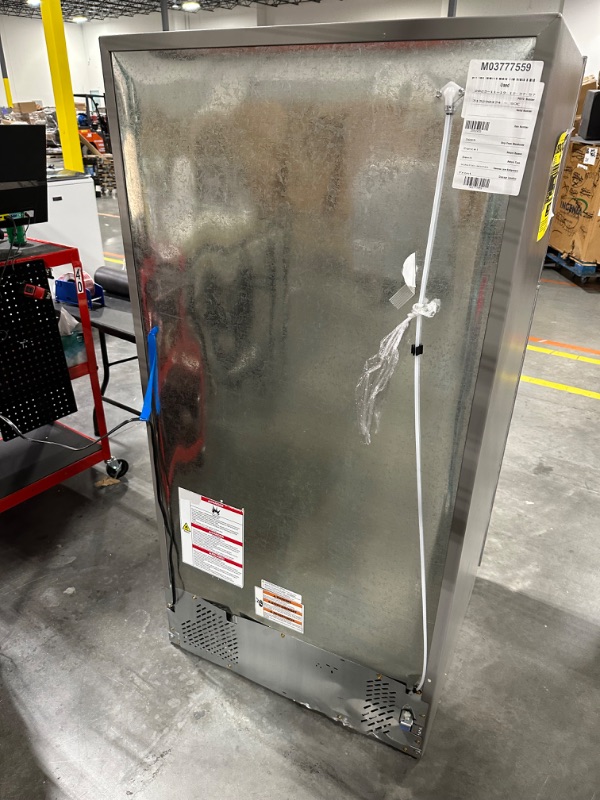 Photo 10 of Whirlpool 20.5-cu ft Top-Freezer Refrigerator (Fingerprint Resistant Stainless Steel)
*fridge handles are located inside for installation* *product is factory sealed* *small dent behind product*

*product plug is bent- view picture*
