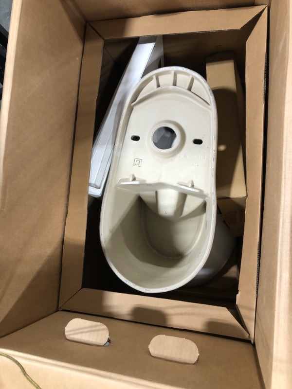 Photo 4 of 2-piece 1.1 GPF/1.6 GPF Dual Flush Round Toilet in White
