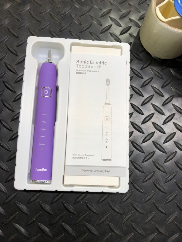 Photo 2 of 7AM2M Electric Toothbrush with 6 Brush Heads for Kids and Chlidren, One Charge for 100 Days,Wireless Fast Charge, 5 Modes with 2 Minutes Build in Smart Timer,IPX7 Waterproof(Purple)