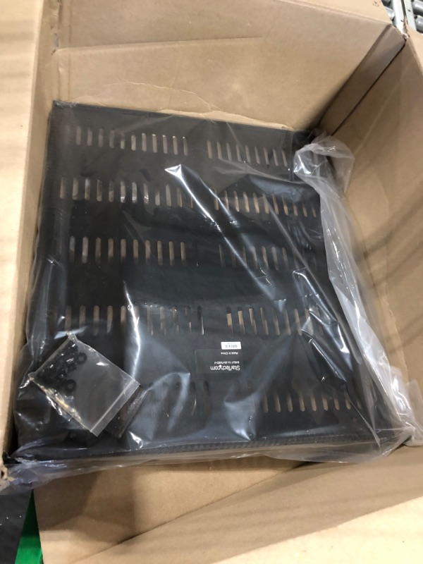 Photo 1 of StarTech.com 1U Server Rack Shelf - Universal Vented Rack Mount Cantilever Tray for 19" Network Equipment Rack & Cabinet - Durable Design - Weight Capacity 55lb/25kg - 20" Deep (SHELF-1U-20-FIXED-V) 1U 20" Depth Rack Shelf