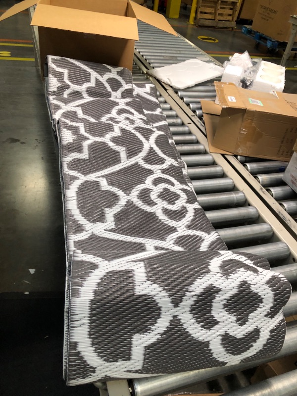 Photo 1 of  Outdoor Rugs on Sale Clearance Patio Rugs Waterproof Plastic Straw Rugs, Camping Rugs, Porch, Balcony, Deck, Pool Rugs Black White 5'x8'
***Stock photo shows a similar product, not exact***
