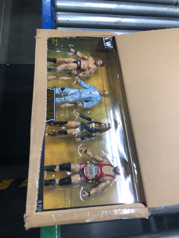 Photo 1 of All Elite Wrestling AEW Unrivaled Champion 4 Pack - Four 6-Inch Figures with Title Belts and Accessories - Amazon Exclusive