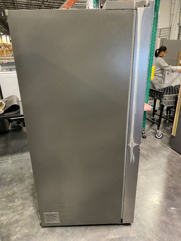 Photo 5 of LG 27.6-cu ft Side-by-Side Refrigerator with Ice Maker (Printproof Stainless Steel) -- minor scratches small dents from transport 