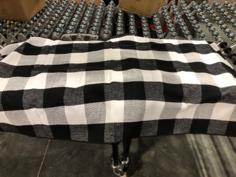 Photo 1 of **HAS STAINS** 90 x 150 cm checkered rug