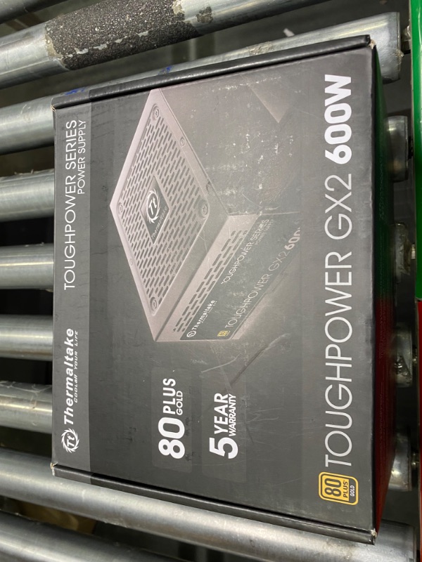 Photo 2 of Thermaltake Toughpower GX2 80+ Gold 600W SLI/Crossfire Ready Continuous Power ATX 12V V2.4/EPS V2.92 Non Modular Power Supply 5 Year Warranty PS-TPD-0600NNFAGU-2 600W Gold Power