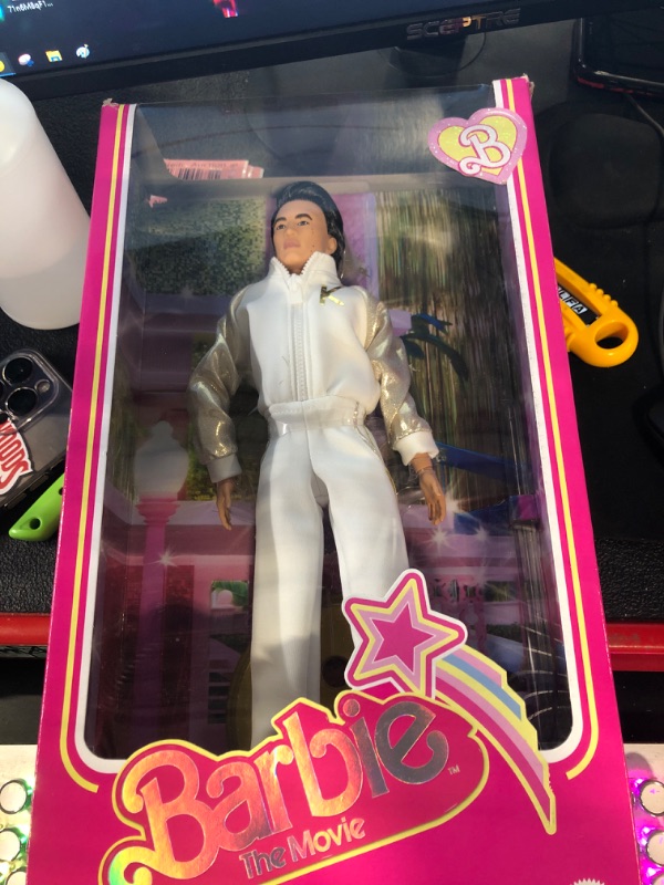 Photo 2 of Barbie The Movie Signature Ken in White and Gold Tracksuit Exclusive Doll HPK04 Gold,white