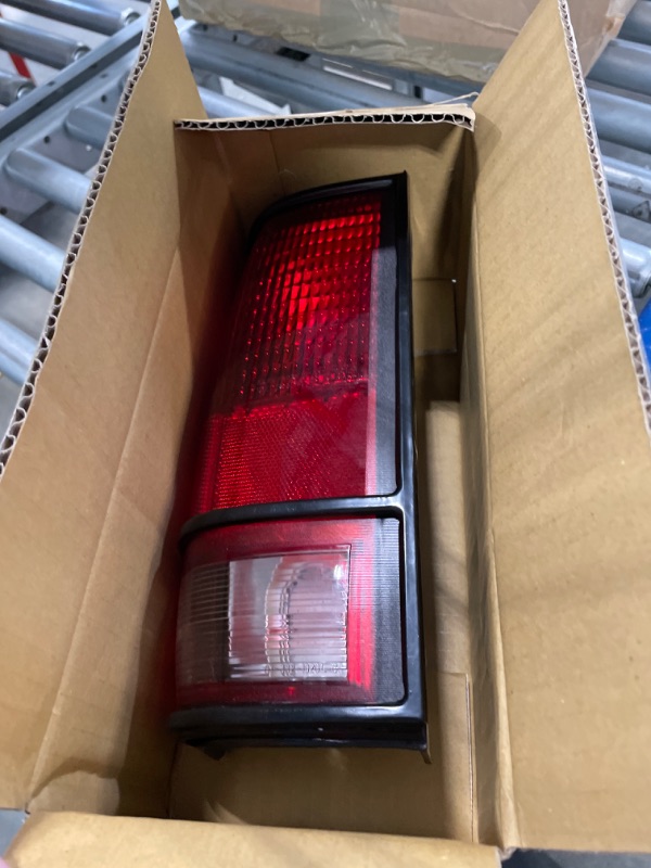 Photo 1 of Dorman 1610072 Driver Side Tail Light Assembly Compatible with Select Chevrolet/GMC Models