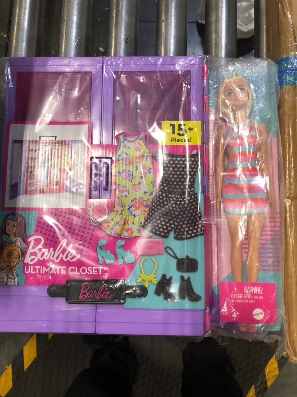 Photo 2 of Barbie Fashionistas Ultimate Closet Portable Fashion Toy with Doll, Clothing, Accessories and Hangers, Gift for 3 Years Old and Up Purple Closet with Doll