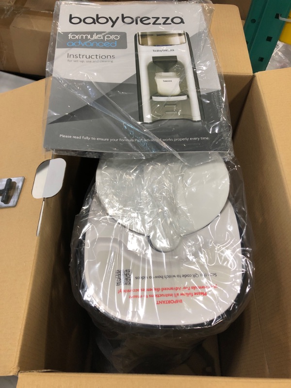 Photo 1 of New and Improved Baby Brezza Formula Pro Advanced Formula Dispenser Machine - Automatically Mix a Warm Formula Bottle Instantly - Easily Make Bottle with Automatic Powder Blending