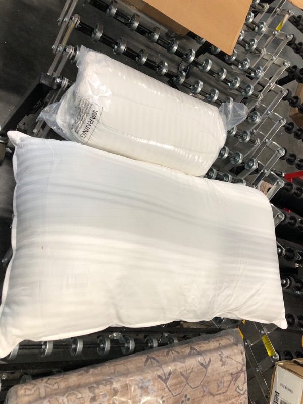 Photo 1 of 2 white pillows