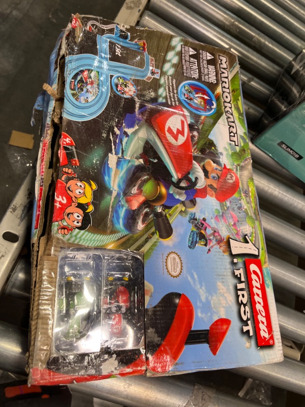 Photo 3 of Carrera First Mario Kart - Slot Car Race Track With Spinners - Includes 2 Cars: Mario and Yoshi - Battery-Powered Beginner Racing Set for Kids Ages 3 Years and Up Mario Kart w/ Spinners