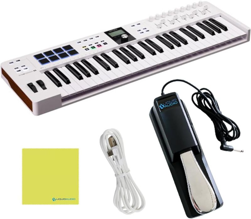 Photo 1 of Arturia KeyLab Essential MK3 49 Key Keyboard, MIDI Keyboard Controller Bundle with Sustain Pedal, USB Cable, Polishing Cloth- Music Recording Software Included, MIDI Piano for Home Studio Setup, White
