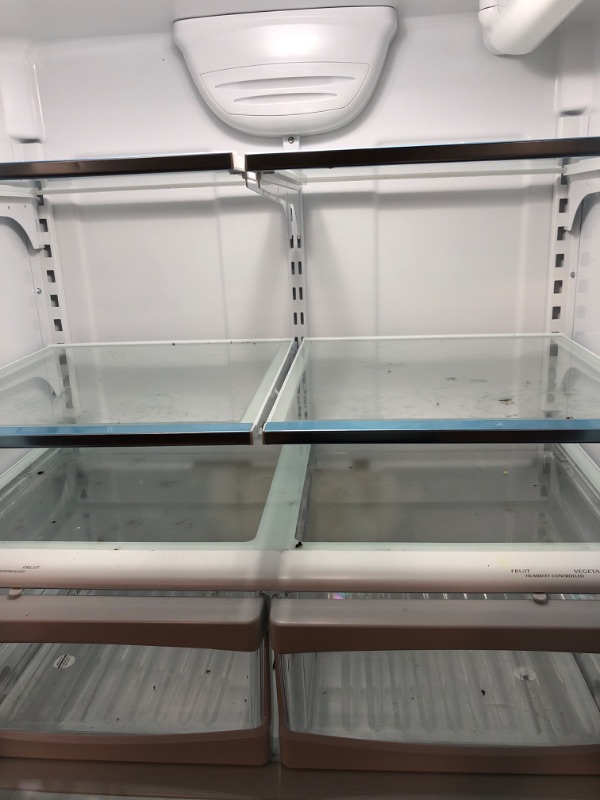 Photo 3 of Whirlpool 25.2-cu ft French Door Refrigerator with Ice Maker (Fingerprint Resistant Stainless Steel) ENERGY STAR
minor scratches  and dent  needs to be cleaned !! 

