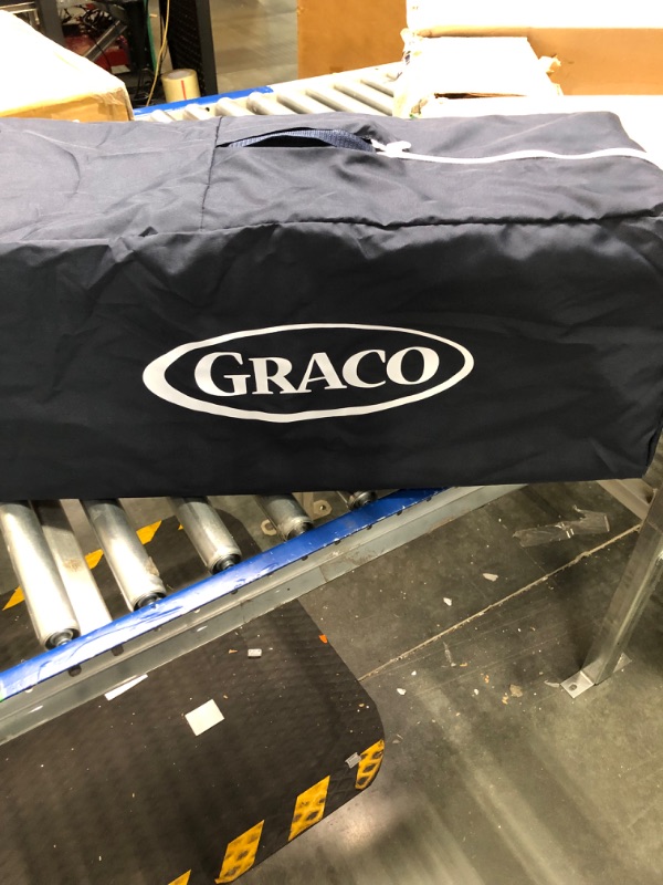 Photo 1 of Graco Pack and Play On the Go Playard | Includes Full-Size Infant Bassinet, Push Button Compact Fold, Stratus , 39.5x28.25x29 Inch (Pack of 1)