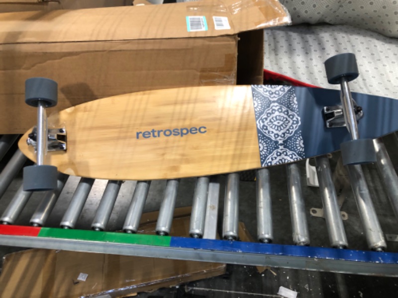 Photo 1 of Retrospec Zed Longboard Skateboard Complete Cruiser | Bamboo & Canadian Maple Wood Cruiser w/ Reverse Kingpin Trucks for Commuting, Cruising, Carving & Downhill Riding Pintail Navy Paisley
