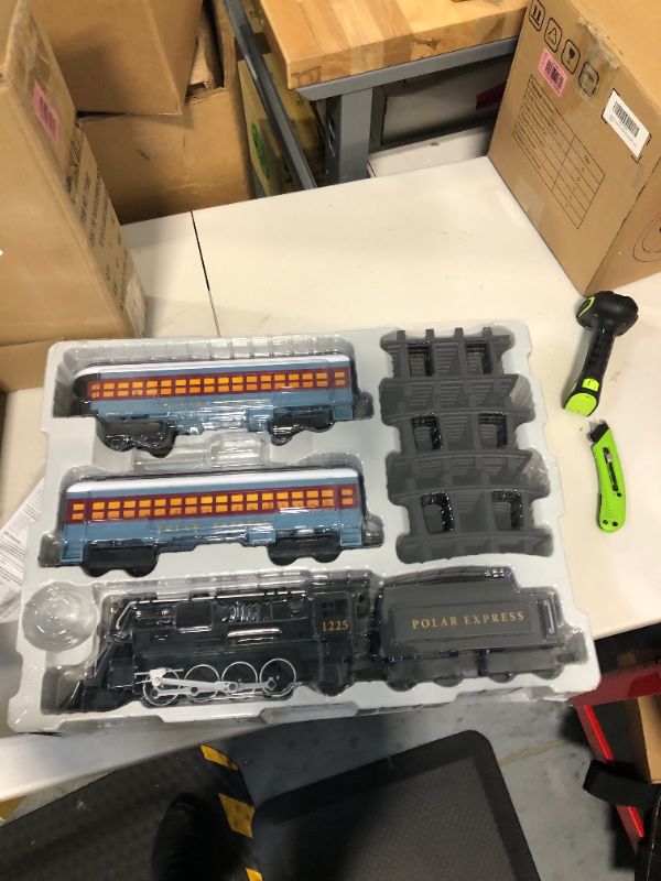 Photo 4 of Lionel The Polar Express Ready-to-Play Set, Battery-Powered Berkshire-Style Model Train Set with Remote , Black