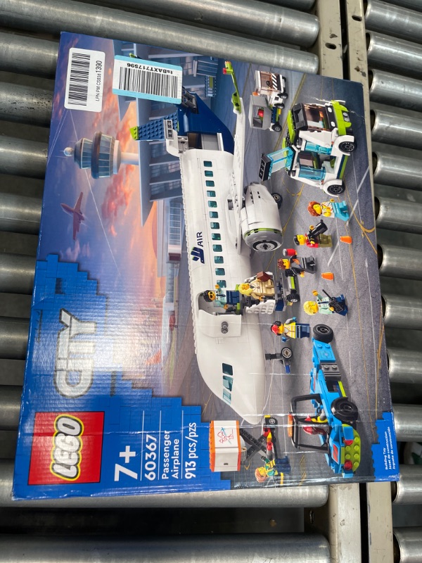 Photo 2 of LEGO City Passenger Airplane 60367 Building Toy Set; Fun Airplane STEM Toy for Kids with a Large Airplane, Passenger Bus, Luggage Truck, Container Loader, and 9 Minifigures