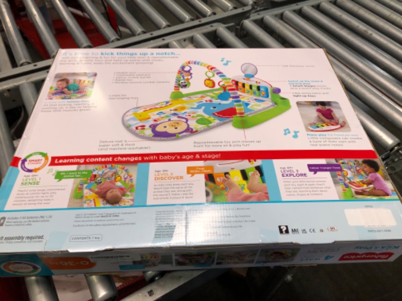 Photo 1 of Fisher-Price Deluxe Kick & Play Piano Gym