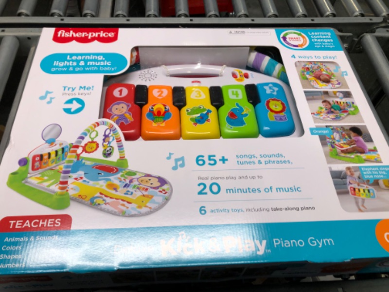 Photo 1 of Fisher-Price Deluxe Kick & Play Piano Gym