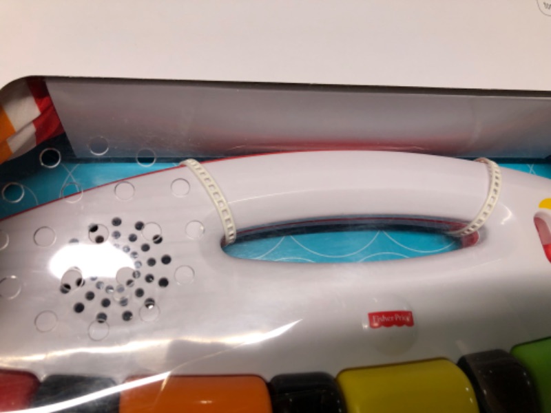 Photo 1 of Fisher-Price Deluxe Kick & Play Piano Gym