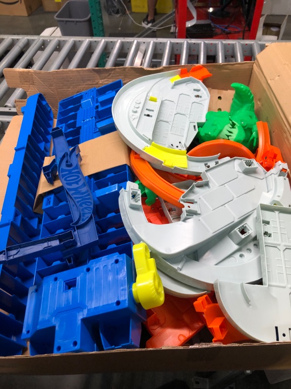 Photo 1 of Hot Wheels Track Set, Ultimate Garage Toy Vehicle Playset With Moving T-Rex Dinosaur, Storage For 100+ Vehicles, 3ft+ Tall