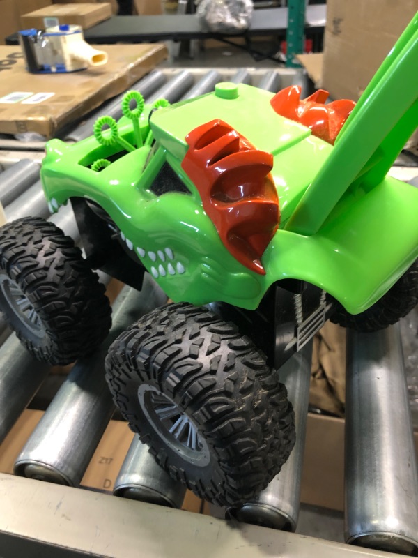Photo 4 of Car dinosaur monster truck 30cm with battery-powered bubble blower with 350ml filling in a
