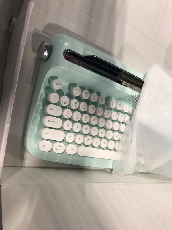 Photo 5 of TISHLED Typewriter Keyboard Wireless Bluetooth 5.0 Retro Aesthetic Cute Kawaii Round Keycaps 106-Key with Num Pad Clicky Mechanical Feeling with Pad/Phone Holder for Windows/Mac OS/Android/iOS (Mint)