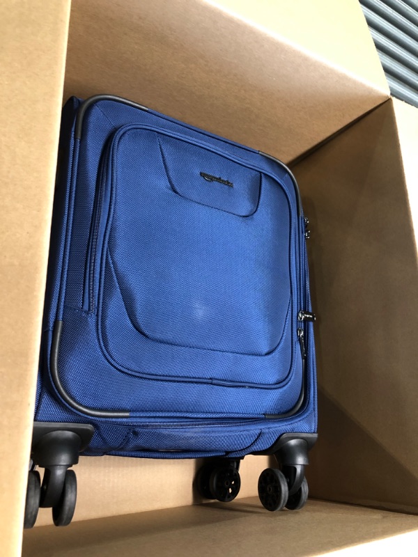 Photo 1 of Amazon Basics Expandable Softside Carry-On Spinner Luggage Suitcase With TSA Lock And Wheels - 20.4 Inch, 20.4-inch Suitcase blue