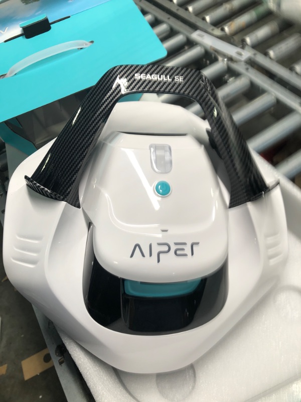 Photo 2 of AIPER Cordless Robotic Pool Cleaner, Pool Vacuum with Dual-Drive Motors, Self-Parking, Lightweight, Perfect for Above/In-Ground Flat Pools up to 35 Feet (Lasts 50 Mins) - Seagull 600 White