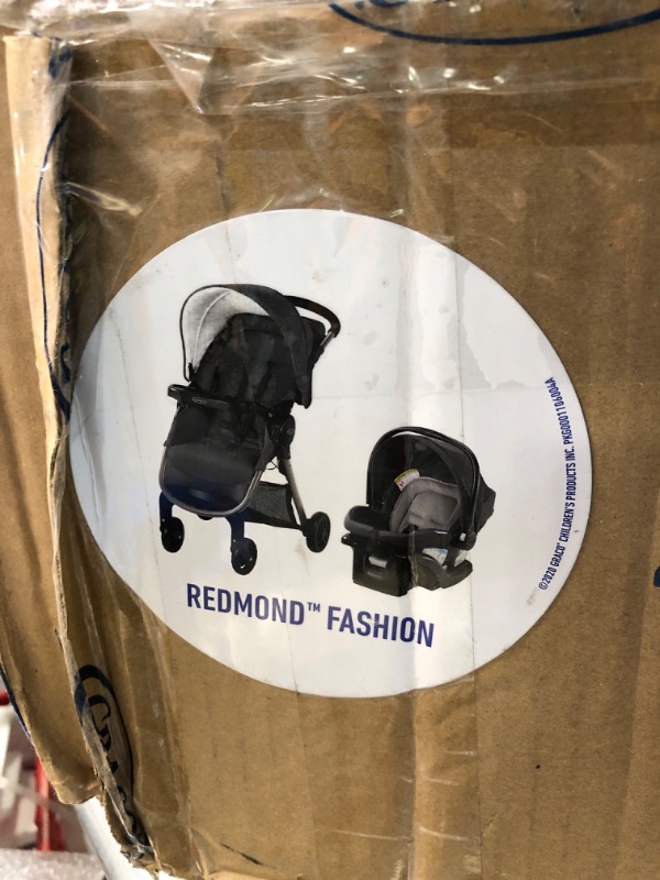 Photo 1 of Graco FastAction SE Travel System | Includes Quick Folding Stroller and SnugRide 35 Lite Infant Car Seat, Redmond FastAction Fold SE Redmond