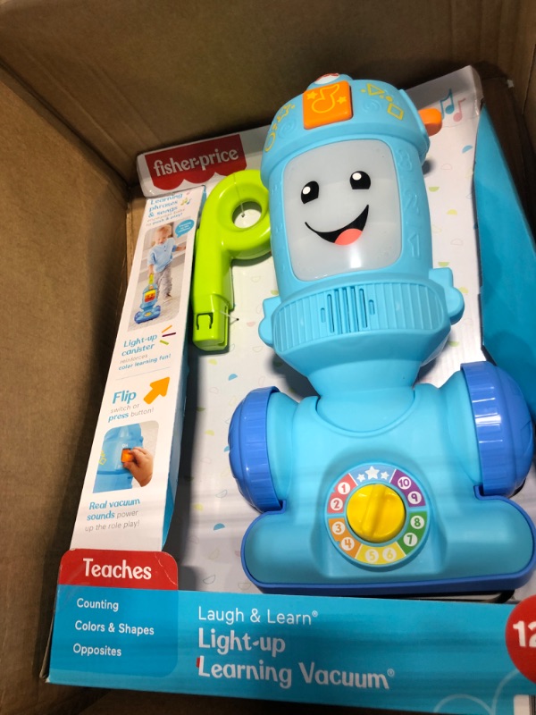 Photo 3 of Fisher-Price Laugh & Learn Toddler Toy Vacuum, Push Toy with Lights Music and Educational Songs, Light-Up Learning