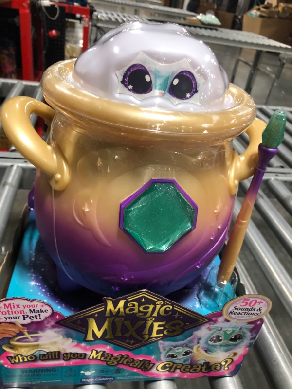 Photo 1 of Magic Mixies Magical Misting Cauldron with Interactive 8 inch Blue Plush Toy and 50+ Sounds and Reactions, Multicolor