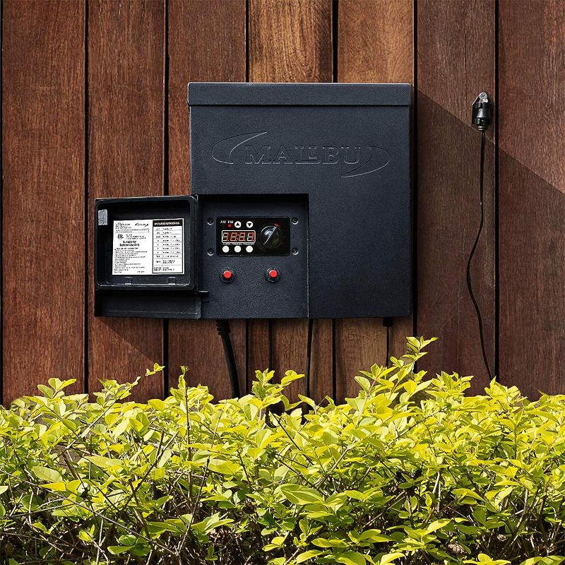 Photo 1 of Malibu 600 Watt Power Pack with Sensor Photo Cell and Weather Shield for Low Voltage Landscape Lighting Spotlight Outdoor Transformer 120V Input 12V Output 8100-0600-01
