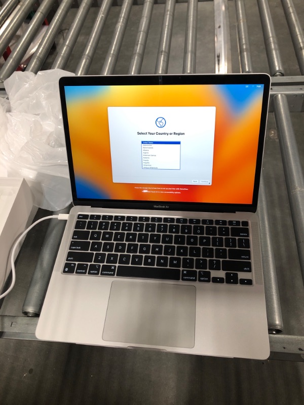 Photo 1 of Apple 2020 MacBook Air Laptop M1 Chip, 13" Retina Display, 8GB RAM, 256GB SSD Storage, Backlit Keyboard, FaceTime HD Camera, Touch ID. Works with iPhone/iPad; Silver 256GB Silver