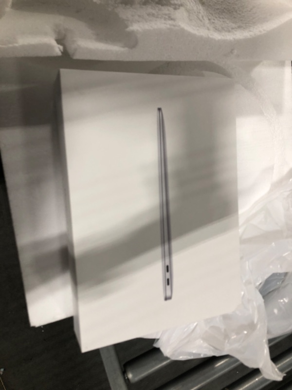 Photo 1 of Apple 2020 MacBook Air Laptop M1 Chip, 13" Retina Display, 8GB RAM, 256GB SSD Storage, Backlit Keyboard, FaceTime HD Camera, Touch ID. Works with iPhone/iPad; Silver 256GB Silver