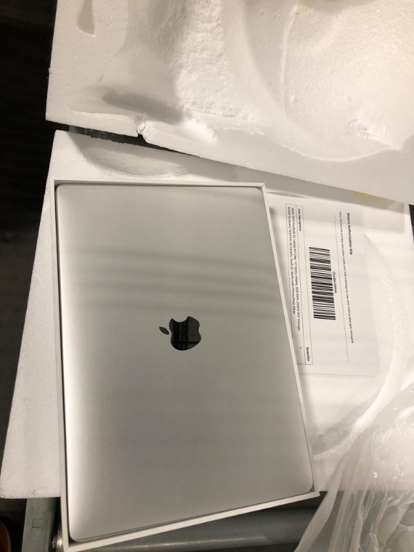 Photo 1 of Apple 2020 MacBook Air Laptop M1 Chip, 13" Retina Display, 8GB RAM, 256GB SSD Storage, Backlit Keyboard, FaceTime HD Camera, Touch ID. Works with iPhone/iPad; Silver 256GB Silver
