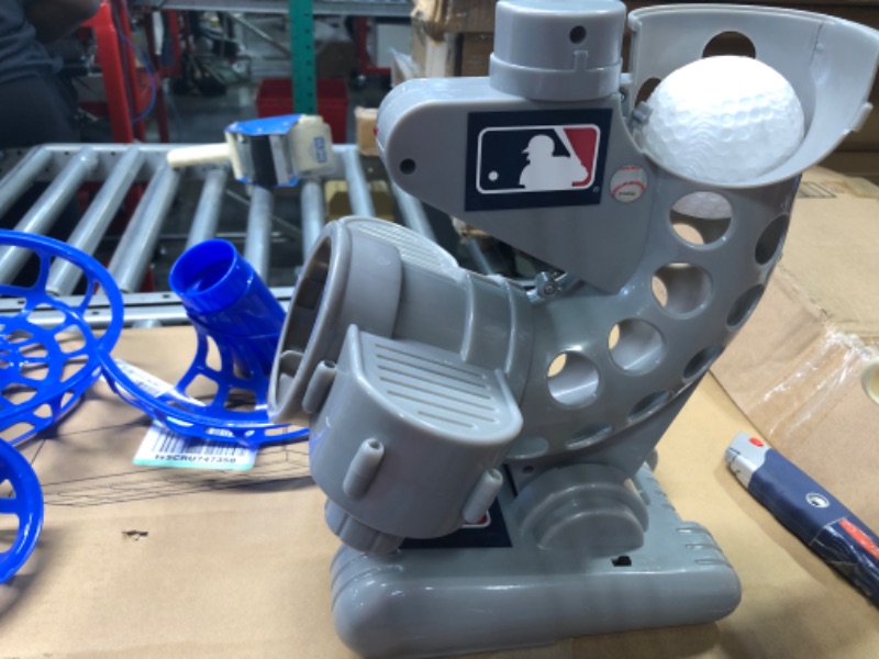 Photo 1 of Franklin Sports MLB Electronic Baseball Pitching Machine – Height Adjustable – Ball Pitches Every 7 Seconds Pitching Machine (Includes 6 Balls)