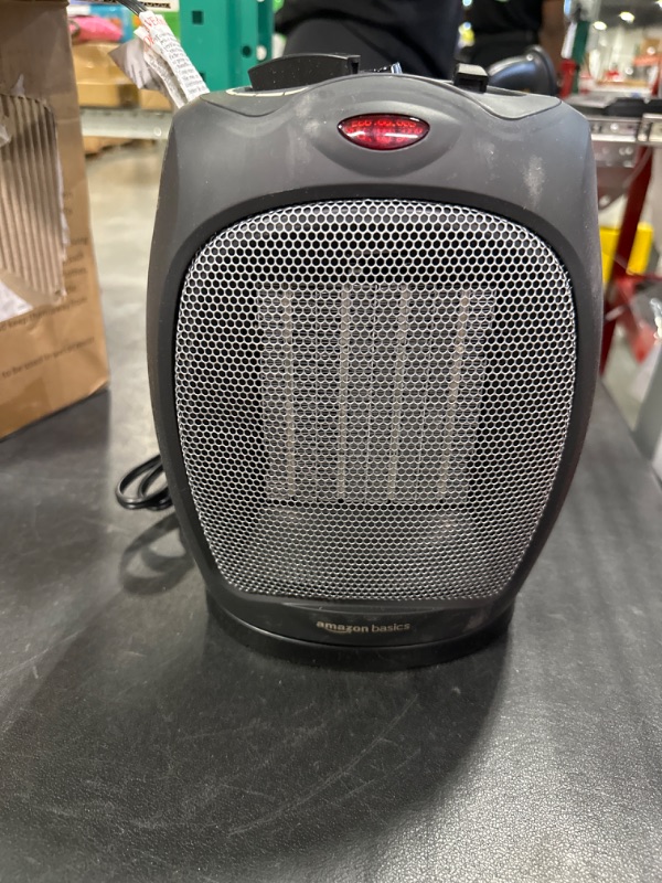 Photo 3 of Amazon Basics 1500W Oscillating Ceramic Heater with Adjustable Thermostat, Black Black Heater with Oscillating