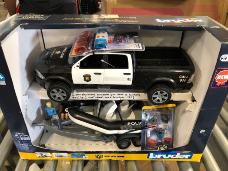 Photo 4 of Bruder RAM 2500 Police Pickup with L + S Module Trailer, Boat and 2 Figures