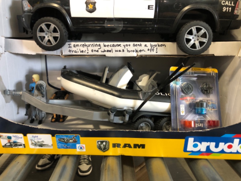 Photo 3 of Bruder RAM 2500 Police Pickup with L + S Module Trailer, Boat and 2 Figures