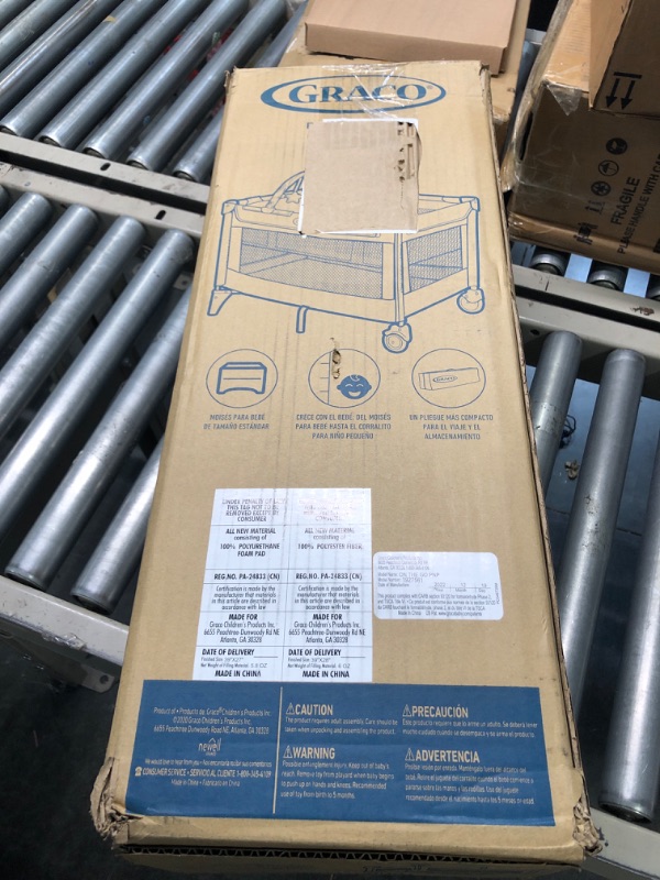 Photo 1 of Graco Pack and Play On the Go Playard | Includes Full-Size Infant Bassinet, Push Button Compact Fold, Stratus , 39.5x28.25x29 Inch (Pack of 1) W/ Bassinet Insert Stratus