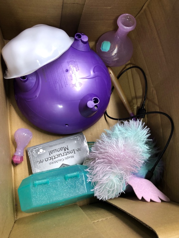 Photo 1 of Magic Mixies Magical Misting Cauldron with Interactive 8 inch Blue Plush Toy and 50+ Sounds and Reactions, Multicolor
