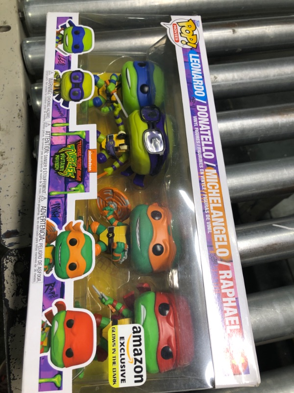 Photo 3 of Funko Pop! Movies: Teenage Mutant Ninja Turtles: Mutant Mayhem - Ninja Turtles 4-Pack (Glow in The Dark), Amazon Exclusive