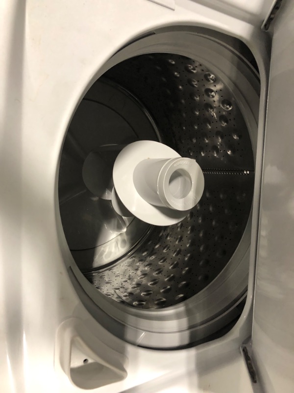 Photo 10 of GE GUD27ESSMWW Unitized Spacemaker 3.8 Washer with Stainless Steel Basket and 5.9 Cu. Ft. Capacity Electric Dryer, White