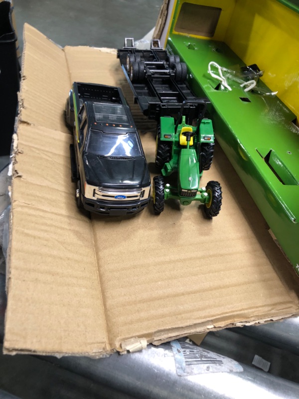 Photo 3 of ERTL 1:32 Scale Ford F350 Pickup and Tractor Set — Includes John Deere Tractor, Ford F350 Pickup and Gooseneck Trailer — 17.25 x 3.2 x 4.5 inches — Ages 3 Years and Up Tractor & Ford